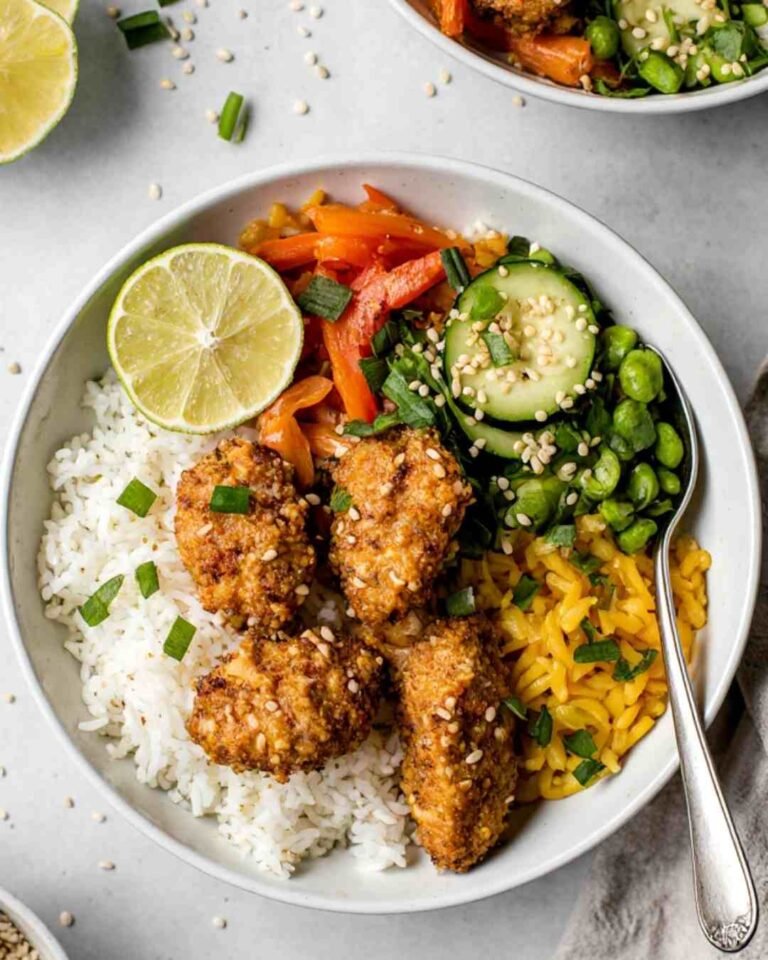Bang Bang Chicken Bowl with rice, veggies, and spicy creamy sauce